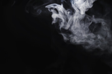 White clouds of vapor smoke are isolated on a black background. overlay