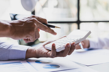 Meeting to discuss financial advisors analyzing auditing and budget planning.