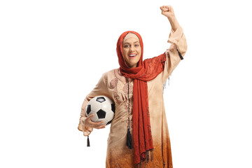 Female in muslim ethnic clothes holding a football and cheering
