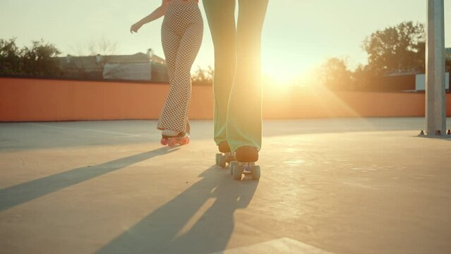 Close up of women doing reverse movement in roller skates