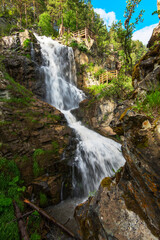 Fototapeta premium Waterfall Kamishlinsky in the Altai Mountains, Siberia