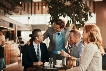 Business people having a meeting in a cafe