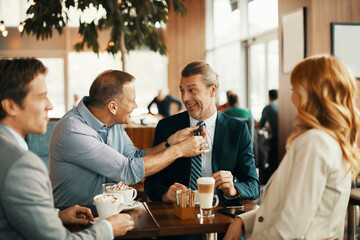 Business people having a meeting in a cafe