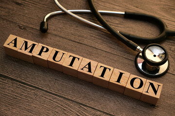 Amputation, text words typography written with wooden letter, health and medical - obrazy, fototapety, plakaty