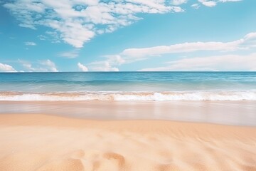 Fototapeta na wymiar Summer beach, view of blue sky, clouds and waves