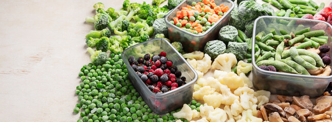 A set of foods for the winter. Various of frozen vegetables and berries - obrazy, fototapety, plakaty