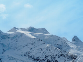 Four summits of Bellavista seen from Diavolezza. With the elevation 3922 m, Bellavista is mountain in Bernina range between Switzerland and Italy. On the far right is Crest' Aguzza or Cresta Guzza.