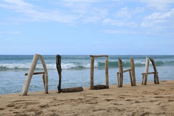 Driftwood Aloha Sign on Beach