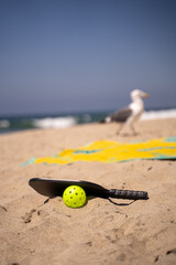 Obraz premium beach towel with pickleball paddle and ball