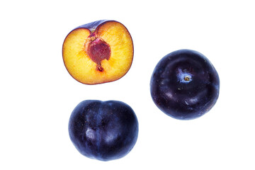 Ripe plum slice isolated on a white background. Fresh fruits