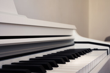 Elegance upright piano. Classic piano keyboard with black and white keys. Musical image close up - Powered by Adobe