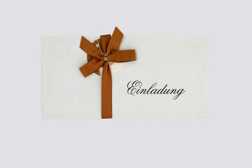 envelope with invitation inscription and bow, gift card with bow - 667754440