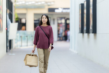 Woman hold with shopping bag in the mall