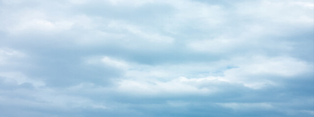 Obraz premium sunny sky blue light watercolor background. Aquarelle painting brush effect card paper textured canvas cloudy smoke space for text, entertaining card, template. aquamarine color graphics illustration