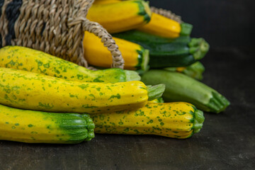 Yellow green leopard spotted zucchini. Vegetables on the table. vegetable marrow harvest. Food...