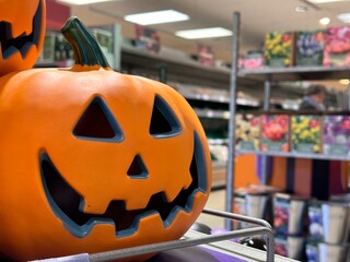 Close up of a decorative jack-o-lantern halloween pumpkin at the store