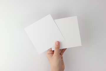 Square Card mockup in minimalist style, two blank cards in hand