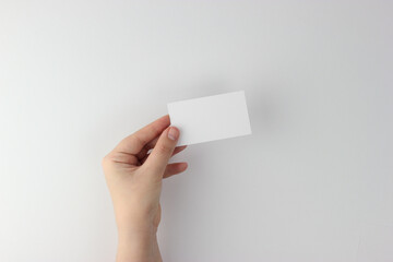 Business Card mockup in minimalist style, blank card in hand
