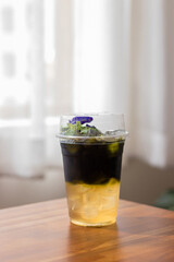 Butterfly pea with lemonade in .plastic glass, Drink feel refreshed and wonderful tasty.