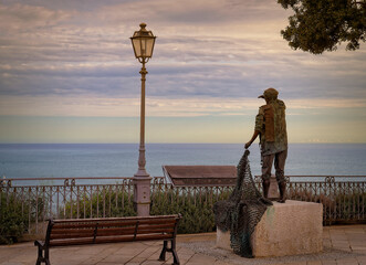 Fototapeta premium statue of a fisherman, Numana, Marche, Italy