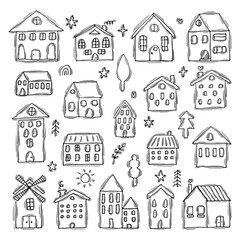 Set of hand drawn houses. Doodle style. Collection of sketched buildings