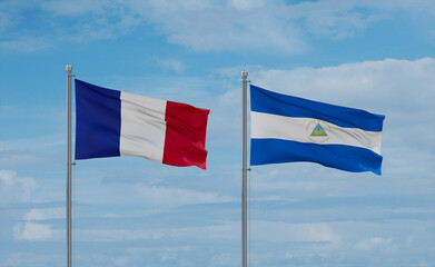 Nicaragua and France flags, country relationship concept
