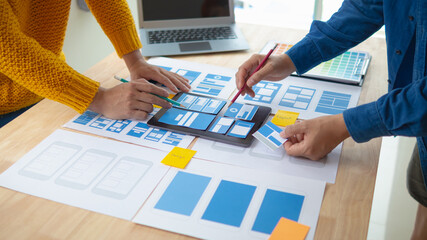 The designer team is designing the uxui system to make the uxui system work well on new phones and support system updates. Website development concept UI UX front end designer