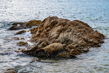 waves splashes on rock in sea shore, pretty calm sea, Bang Sean, Chonburi, Thailand