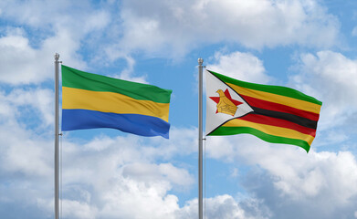 Zimbabwe and Gabon flags, country relationship concept
