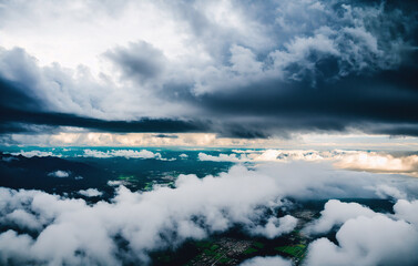 Obraz premium Aerial view of the sea and the city in cloudy day.