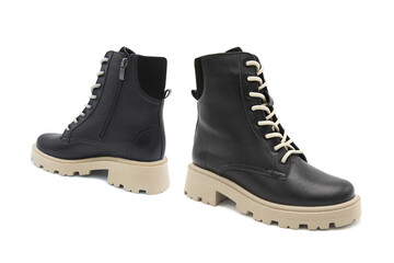 Fashionable suede leather boots isolated on white background. View from all sides.