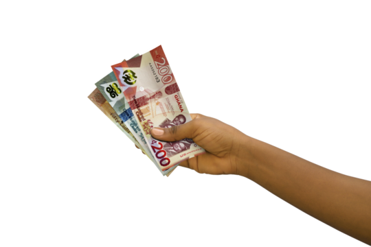 Fair hand holding 3D rendered Ghanaian cedi notes isolated on transparent background