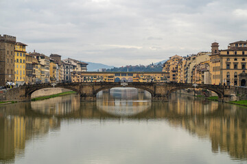 The Ponte Vecchio, medieval bridge over the Arno River in Florence (Italy)