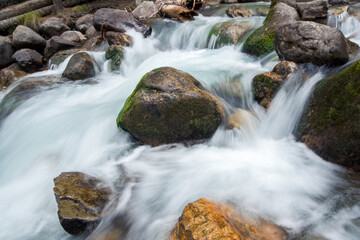Mountain river bathing stones. Caucasus, Russia