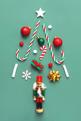 Christmas concept background. Top view of christmas ornaments in the form of a christmas tree