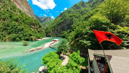 Shala River is a stunning waterway that begins its journey in the Albanian Alps. Its pristine waters are sourced from the melting snow and glaciers of this majestic mountain range. - 667822072