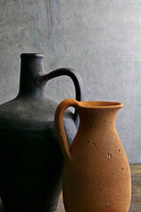 old used empty clay jugs. Still life photography with vintage objects