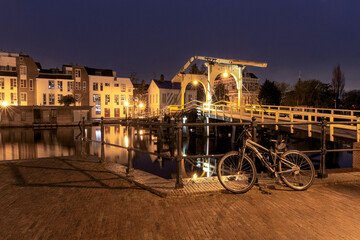 Old drawbridge over the canal in Leiden at dawn.