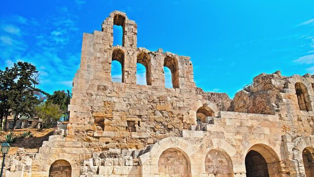A stone Roman theatre structure of Odeon of Herodes Atticus in Athens. Historical and architectural building in Acropolis of Athens, Greece.