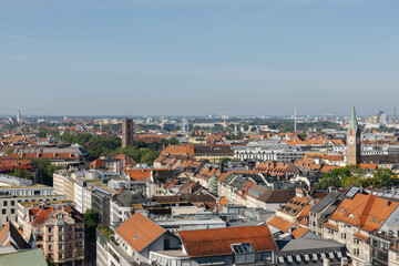 Naklejka na ściany i meble Aerial view of the city of Munich in Germany. Cityscape of Munich on a sunny day