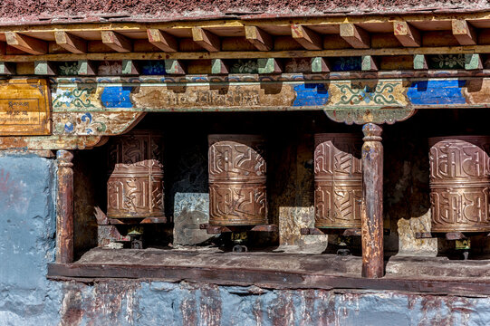 Tibetan prayer wheels at Sakya Monastery also known as Pel Sakya is a Buddhist monastery situated in Sa'gya Town - Tingri county, Tibet - China