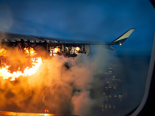 A gloomy vision of a looming air accident observed through a passenger window as interpreted by an AI. A burning or lost engine, flames and smoke as evidence of an impending structural failure.