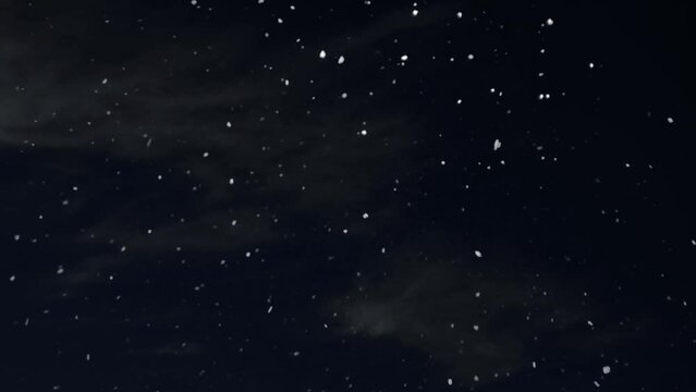 a winter christmas background with falling snow at night