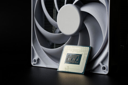 Modern powerful multi-core personal computer processor and massive cooler for cooling it. Heat dissipation, thermal conductivity and processor cooling. Socket LGA 1700. Photo. Selective focus