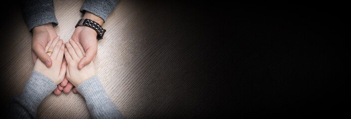 woman and man hand in hand