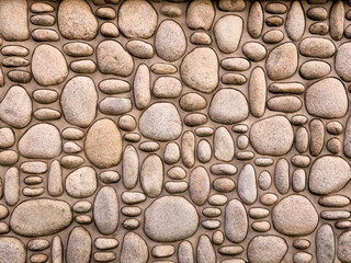rock wall of natural river stones