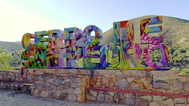 Giant sign with the name of the magical town Cerro de San Pedro, San Luis Potosi, old town like Real de Catorce, Mexico, Magic town. 