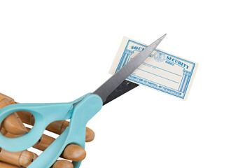 Cuts to Social Security concept with isolated scissors cutting a blank retro SS card