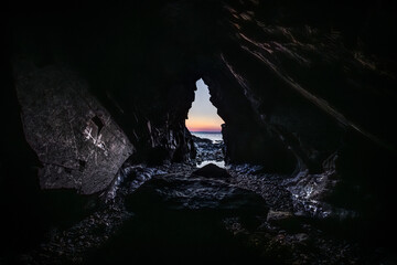 View from a cave at sunset, on the Crozon peninsula, France