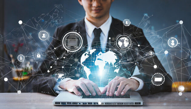 Abstract. Businessman use laptop and synchronize data of business on computer device with global network, Data exchange, Information Transfer, Data science analytics and internet technology